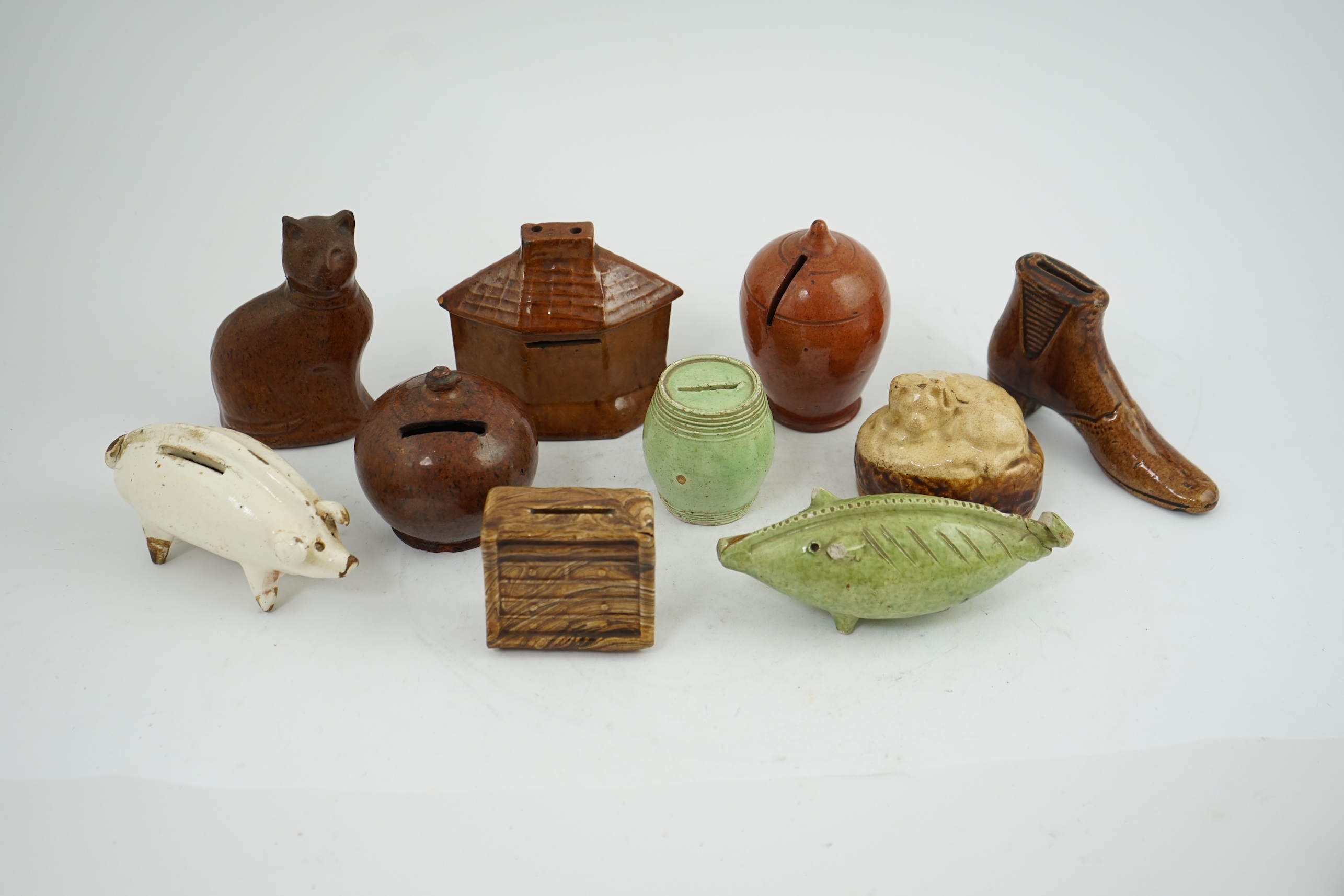 A collection of ten 19th century Dutch and British pottery money boxes